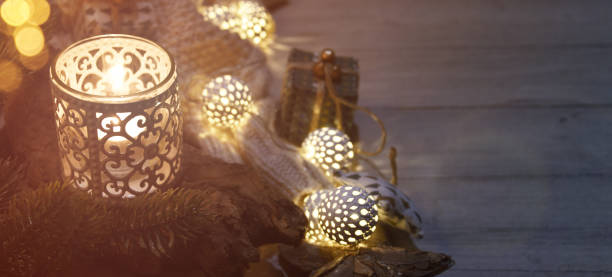 istock Cosy and soft winter background, knitted sweater and lights 1013864140