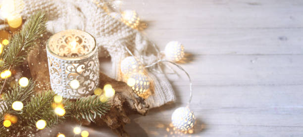 istock Cosy and soft winter background, knitted sweater and lights 1013870130