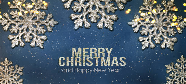 istock Christmas Background with Shining Gold Snowflakes 1013870398