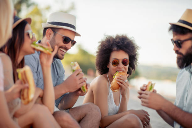 istock Group of friends having fun on the beach 1013886642