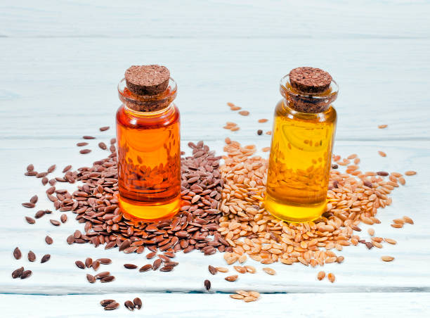 istock Flax seed oil and linen seeds 1013891140