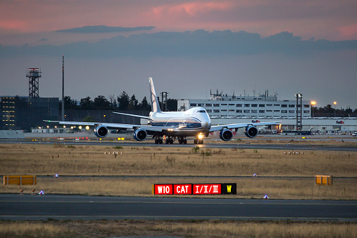 Boeing 747 of AirBridgeCargo is waiting for take off on runway 18 West at Frankfurt International Airport. AirBridgeCargo Airlines is the largest Russian cargo airline and a part of Volga-Dnepr Group.