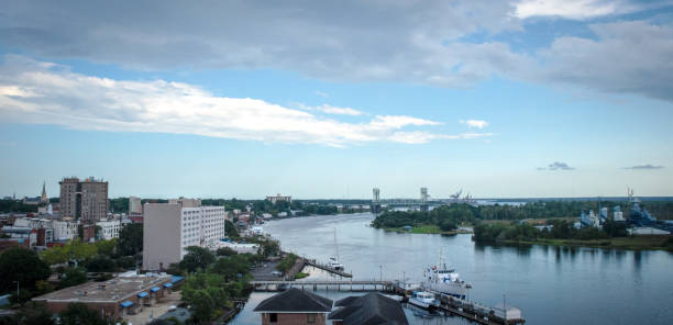 Wilmington, NC, Riverfront A panoramic view of historic downtown Wilmington, NC, USA. cape fear stock pictures, royalty-free photos & images