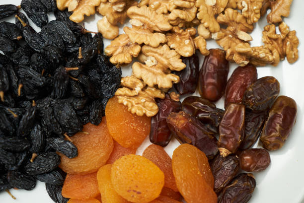 istock Mix of dry nuts and fruits 1013896406