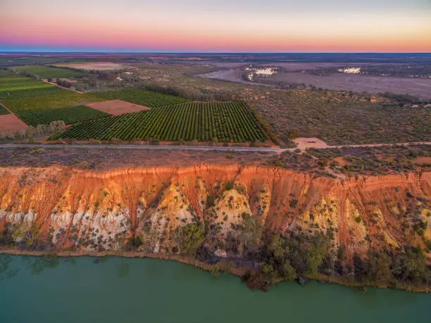 Orange sandstone erosion layers and agricultural fields at Murtho, Riverland, Australia