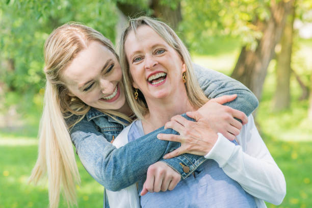 istock Mother and Daughter Laughing Together 1013913696