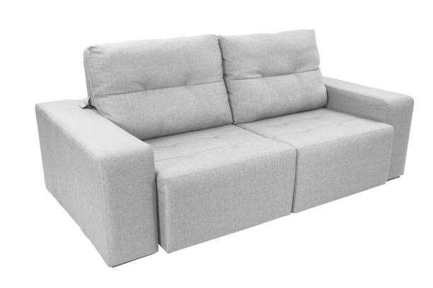 istock Three seats cozy color fabric sofa isolated on white background 1013929010