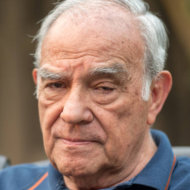 istock Pensive senior man looking at the camera 1013929160