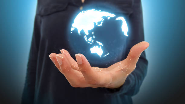 istock Businesswoman on blurred background using world sphere 1013931772