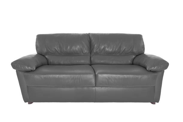 istock Three seats cozy color leather sofa isolated on white background 1013931822