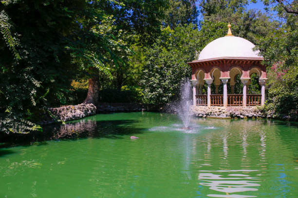 istock Romantic Maria Luisa Park pond, Seville, Spain 1013952148
