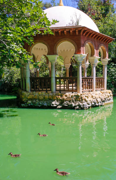 istock Romantic Maria Luisa Park pond, Seville, Spain 1013952158