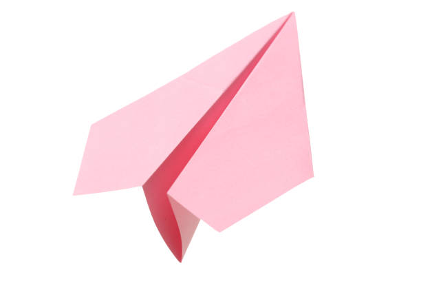 istock Pointed origami paper plane on white background 1013955460
