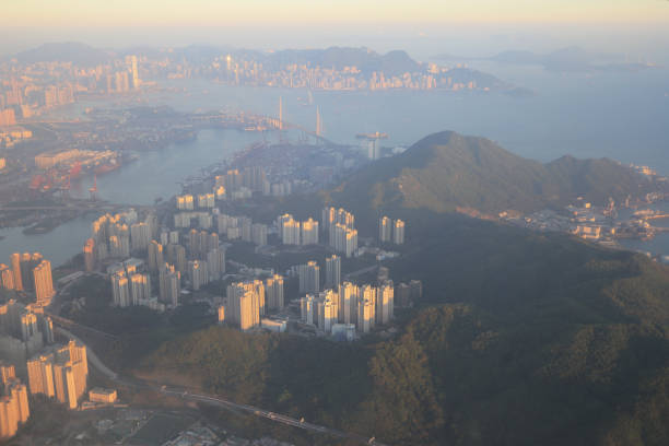 istock view of plane window looking down of a land 1013955536