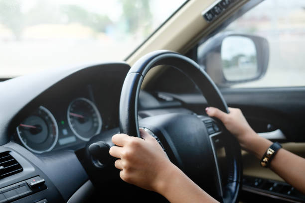 istock Female driving car. Vintage filter 1013964300
