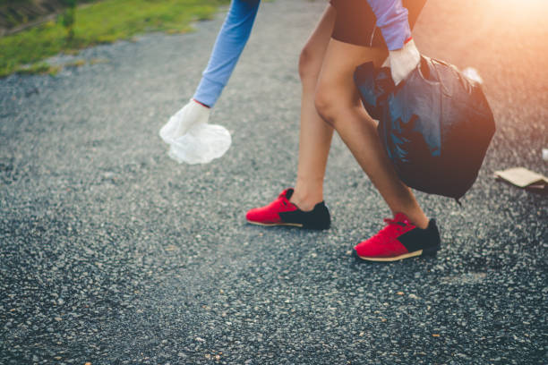 istock Group women volunteer help garbage collection charity environment. 1013969264