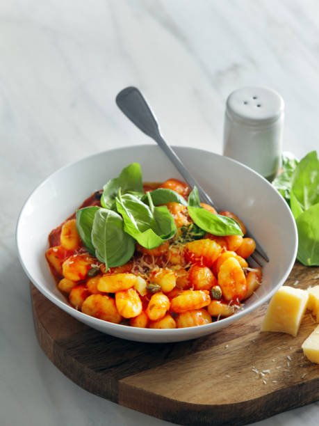 istock Gnocchi with tomato and basil sauce 1013977280