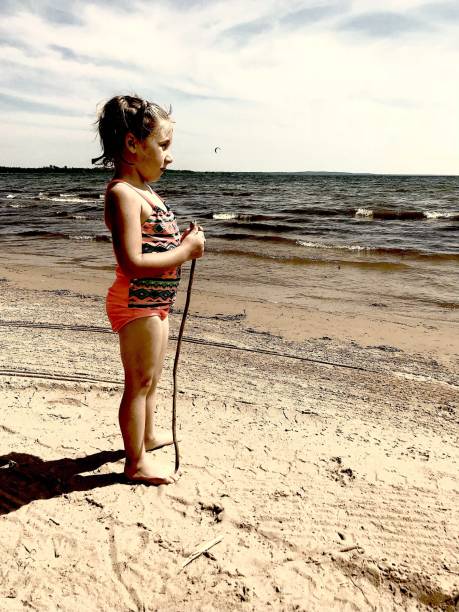 istock Old soul, young body.. a beach story 1013979450