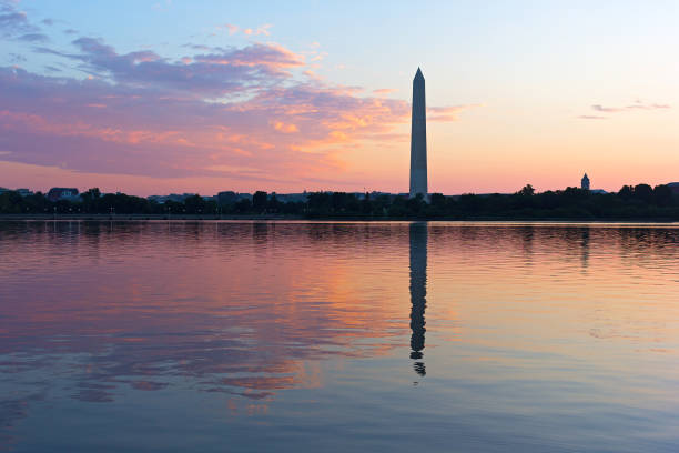 istock Washington DC cityscape at sunrise on a hot summer day. 1013979534
