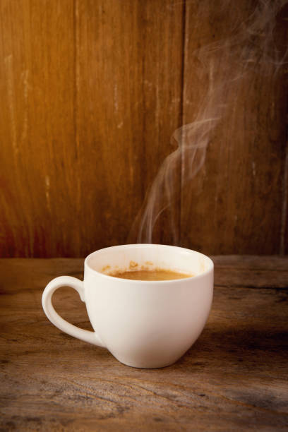 istock coffee cup on wooden background 1013989110