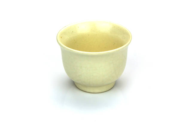 istock Antique tea cup isolated on white background 1013991878