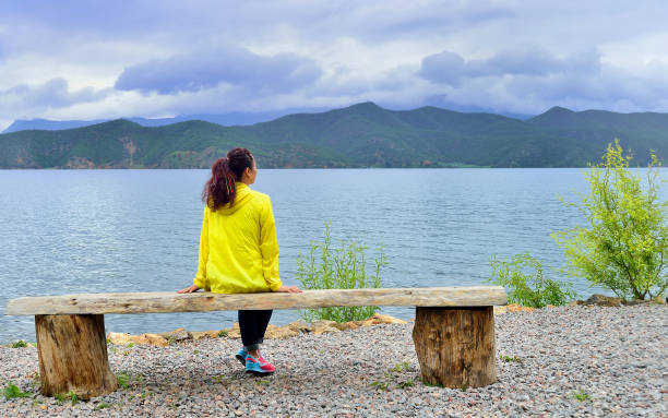 istock A traveler sitting on the lake 1014002378