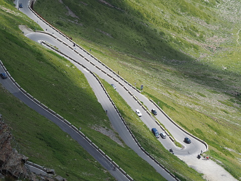 Road to the Stelvio mountain pass in Italy. Amazing view at the mountain bends creating beautiful shapes