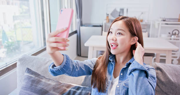 istock woman selfie happily 1014014690