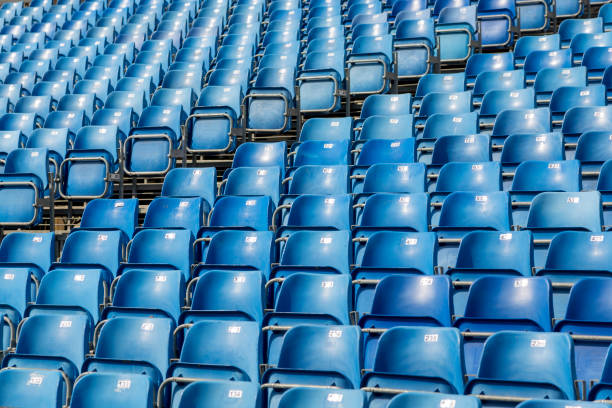 istock Blue plastic chairs with numbers on the tribune 1014015178