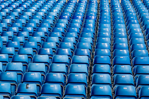 istock Blue plastic chairs with numbers on the tribune 1014015276