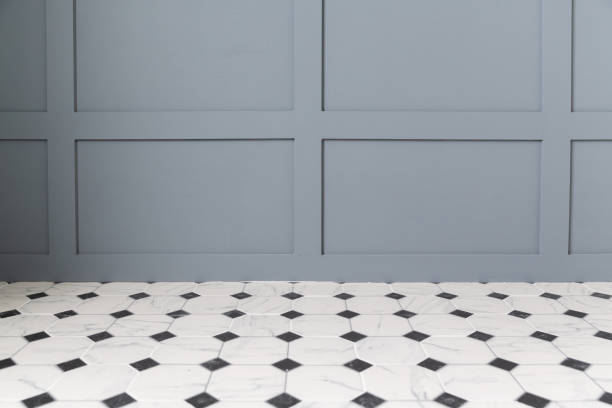 empty black and white castle floor with gray wall. stock photo