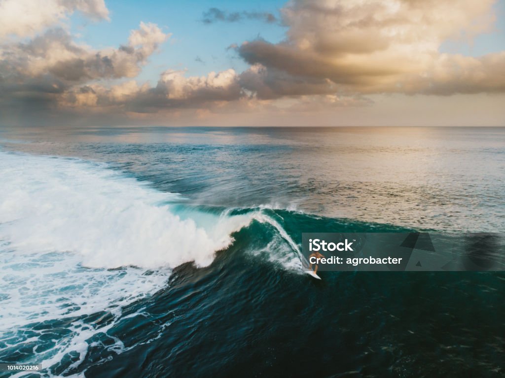 Bali Surf Zone Surfer Riding a Wave Surfing Stock Photo