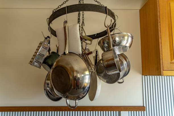 istock ring of cooking utensils hanging in a kitchen. 1014022338