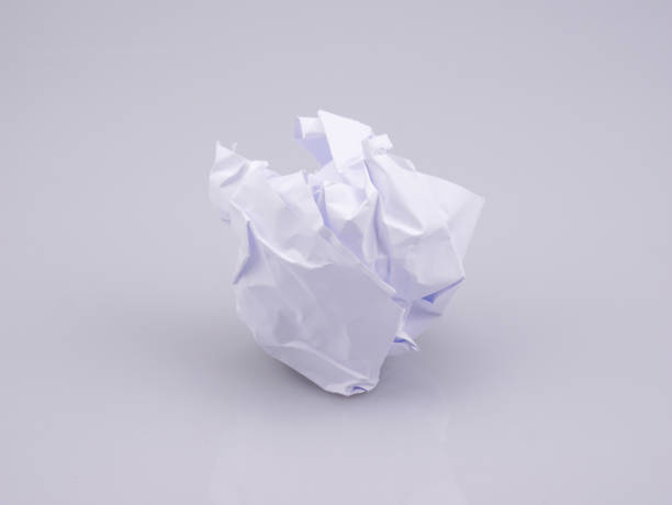 istock Crumpled paper balls on agray background 1014022474