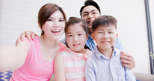 istock family selfie happily 1014028770