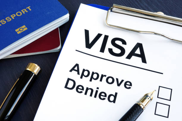 istock Visa approve or denied and passport. Immigration. 1014050682