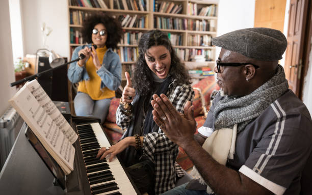 istock Music Teacher Having Lesson At Piano 1014050840