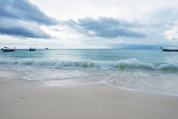 istock View Of Sandy Beach And Stormy Clouds 1014055770