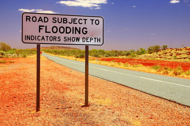 istock Road sign for flooding in Australia 1014056620