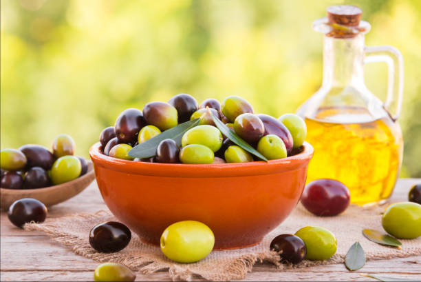 istock Mixed olives in a bowl outdoors 1014060202