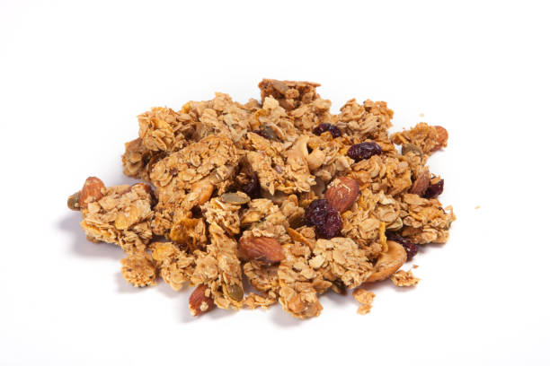 istock Close up pile Granola isolated on white background. 1014065960