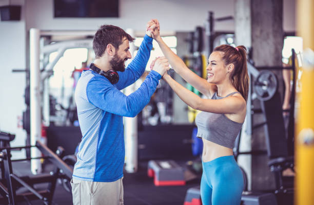 istock Happy couple at gym. 1014073150