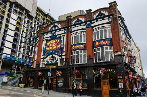 Liverpool, UK: Aug 3, 2018: The Crown Hotel in Liverpool is a Grade 2 listed building. It is located on the corner of Skelhorne Street and Lime Street, close to the main railway station.