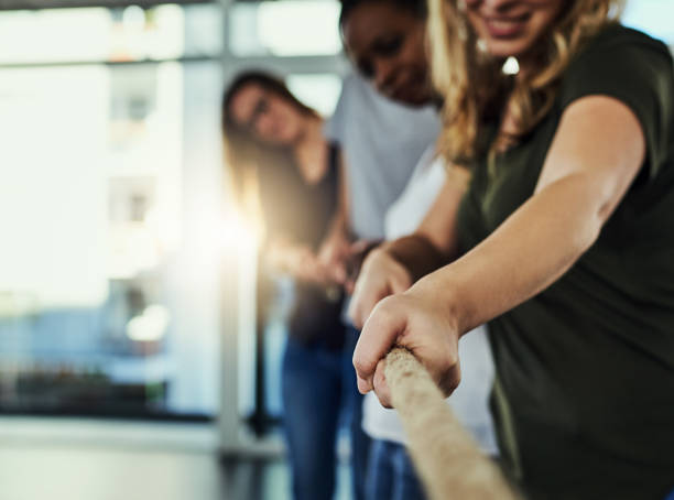 what challenges us can help change us - team human hand cheerful close up imagens e fotografias de stock