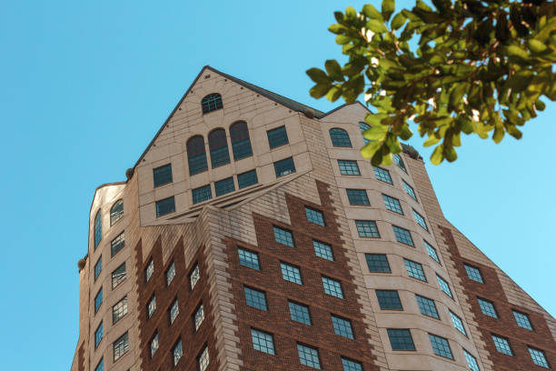 istock Skyscraper of unusual shape in downtown 1014076658