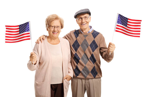 istock Senior couple with American flags 1014077212