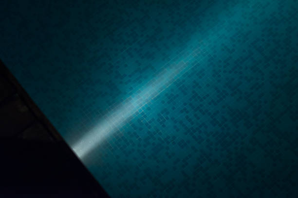 lighting fittings under water in swimming pool at night