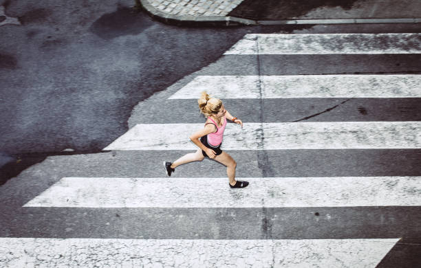 istock Female Athlete Runnin in Urban Environment 1014080488