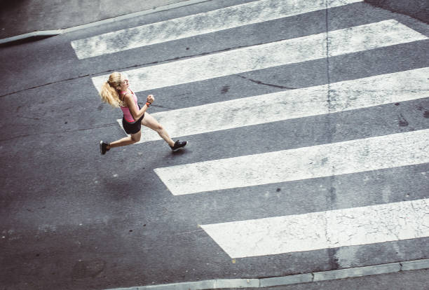 istock Female Athlete Runnin in Urban Environment 1014080494
