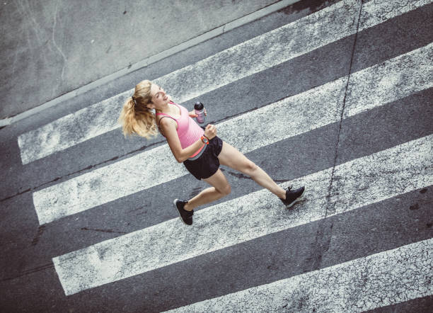 istock Female Athlete Runnin in Urban Environment 1014080498